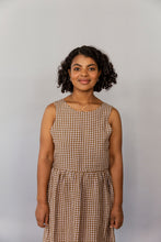 Load image into Gallery viewer, Simple Summer Dress is your trusted companion for carefree vacation days. The sleeveless, maxi-length dress has a round neckline and beautiful cutout back that still covers your bra your bikini straps.  This is a digital product that includes pattern and sewing instructions in Finnish in PDF format.