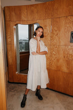 Load image into Gallery viewer, The dreamy Puff Midi Dress adopts to any occasion, depending on the fabric you use. Puff Midi Dress dress has a feminine and relaxed silhouette with wide frills at hem and short puff sleeves with elastic cuffs. The dress has an O-neck and slit opening at back.