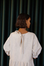 Load image into Gallery viewer, The dreamy Puff Midi Dress adopts to any occasion, depending on the fabric you use. Puff Midi Dress dress has a feminine and relaxed silhouette with wide frills at hem and short puff sleeves with elastic cuffs. The dress has an O-neck and slit opening at back.
