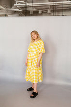 Load image into Gallery viewer, The dreamy Puff Midi Dress adopts to any occasion, depending on the fabric you use. Puff Midi Dress dress has a feminine and relaxed silhouette with wide frills at hem and short puff sleeves with elastic cuffs. The dress has an O-neck and slit opening at back.
